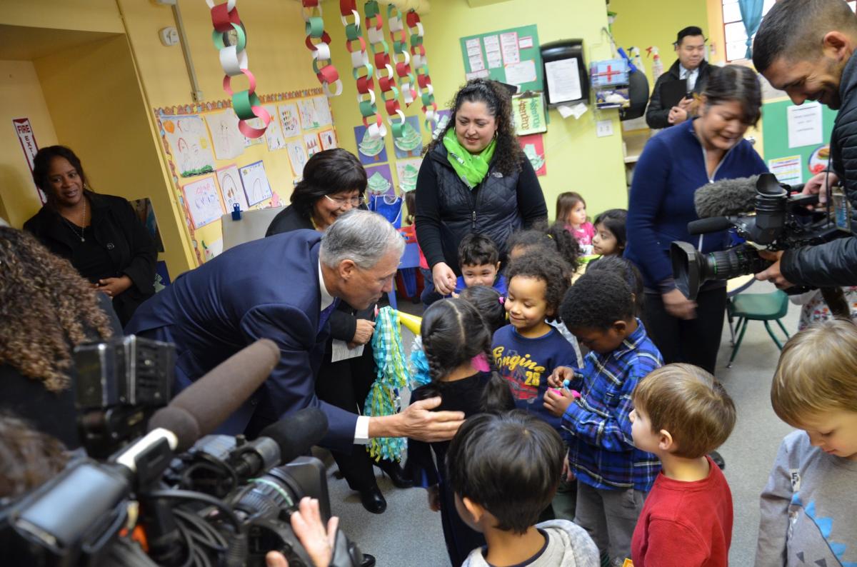 Gov. Jay Inslee with early learning students at El Centro de la Raza in Seattle, Wash., Dec. 15, 2106. (Official Governor’s Office Photo)