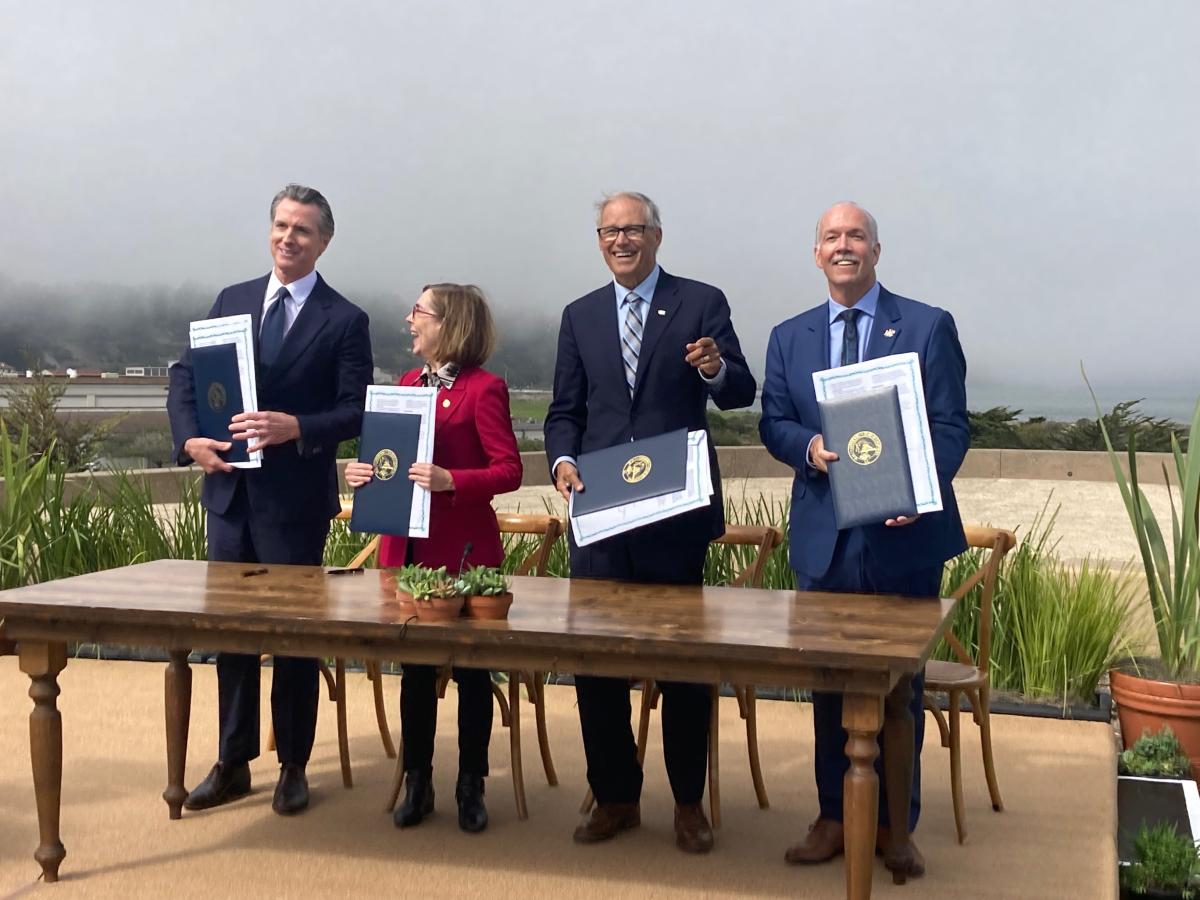 California Gov. Gavin Newsom, Oregon Gov. Kate Brown, Washington Gov. Jay Inslee, and British Columbia Premier John Horgan sign a climate agreement in San Francisco