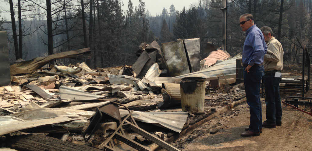 Gov. Inslee and a home destroyed by wildfire in Okanogan County 