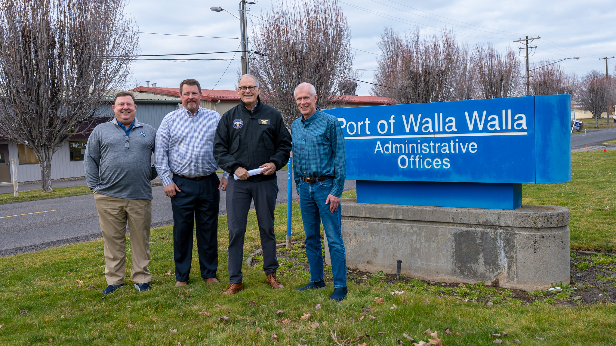 Four men standing in front of the Port of Walla Walla sign.