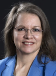 Bea Rector wearing a light blue blazer