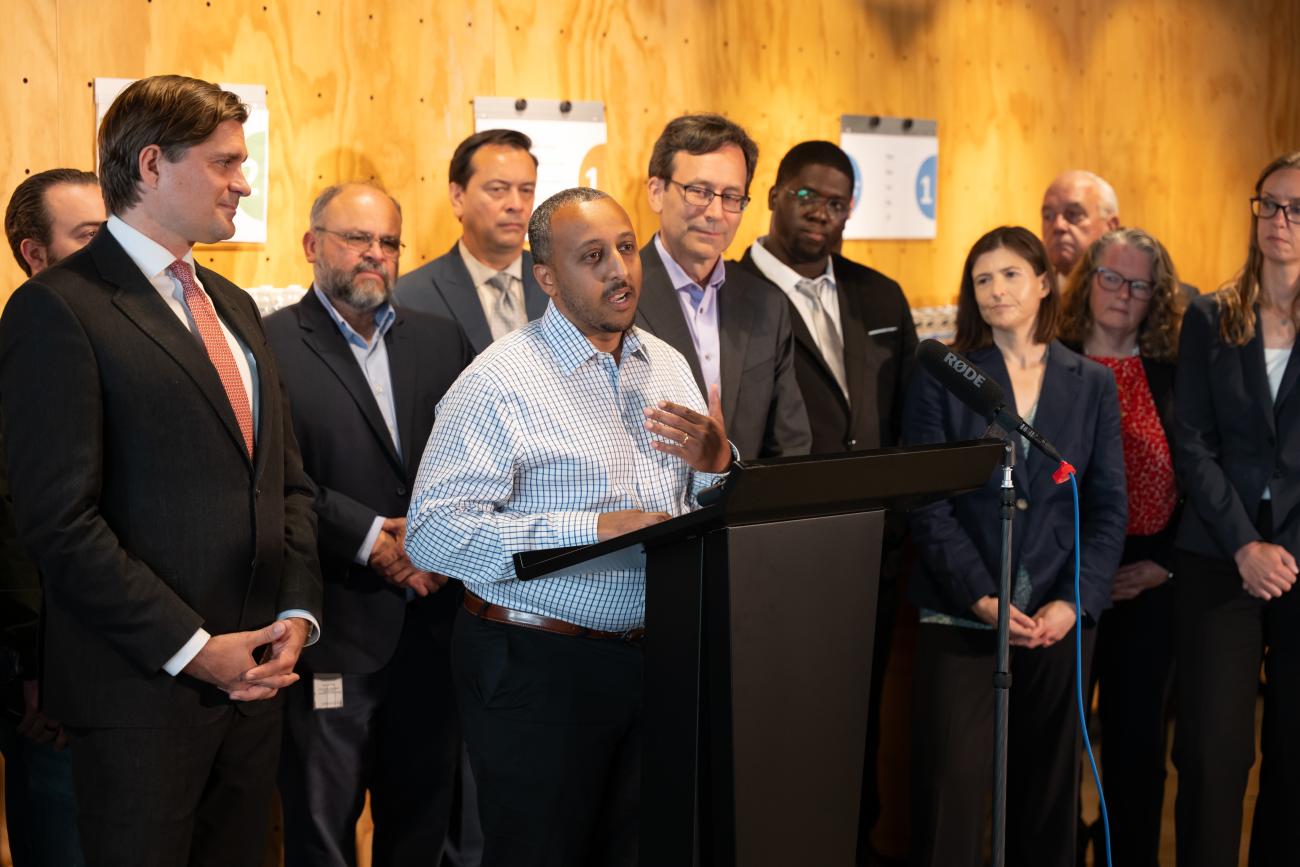 Efrem Fesasha of Boon Boona Coffee talks during tariffs press conferece